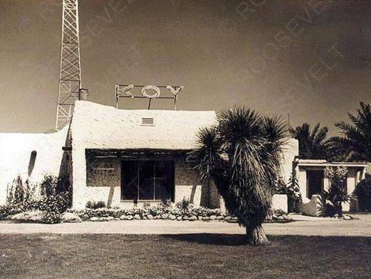 A black and white photo of an old building.